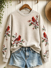 Women's Snowy Winter Red Cardinal Birds on Branches Print Sweatshirt