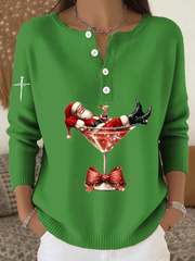 Women‘s Santa Claus sits on a wine glass long-sleeve cardigan